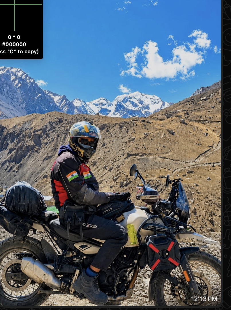 Motorcycle rider on a high-altitude mountain route